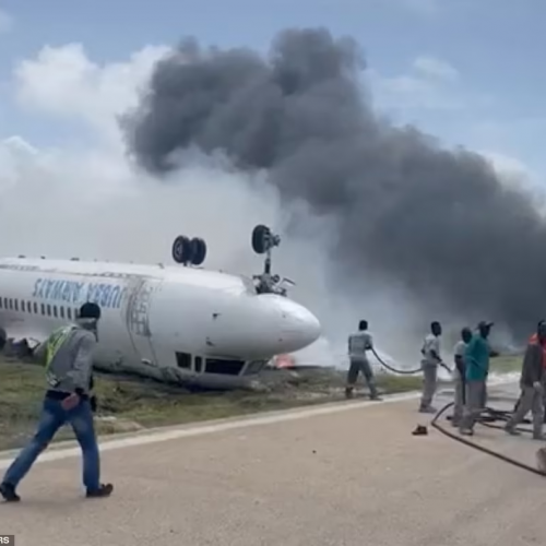 Passenger plane flips over, bursts into flames during crash landing