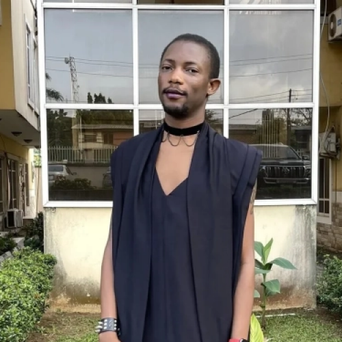 Ezra Olubi: Androgynous Tech CEO honoured by Buhari for his Tech exploit