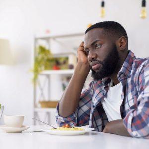 2 African American man having no appetite eating disorder depression problem