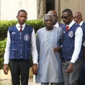 Prof. Ojerinde sandwiched between ICPC operatives