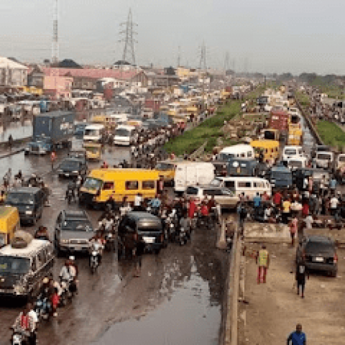 Container-carrying articulated truck falls, kills female biker in Lagos