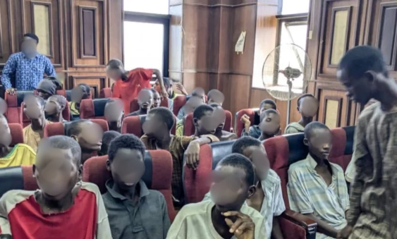 You are currently viewing Court strikes out treason charges against 119 minors arraigned over protest