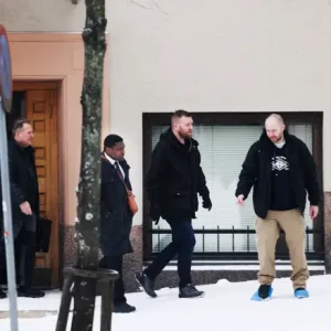 Simon Ekpa with Polish law enforcement