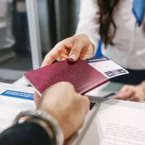 0 Person handing over documents at immigration