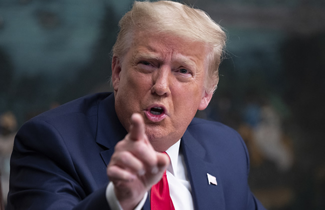 You are currently viewing Trump signs order to pull US from WHO