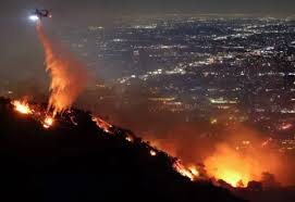 Read more about the article Los Angeles launches strict curfew to stop looting as homes burn in California fires