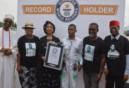 Read more about the article Tinubu Hails 15-year-old Record-Breaking Autistic Painter