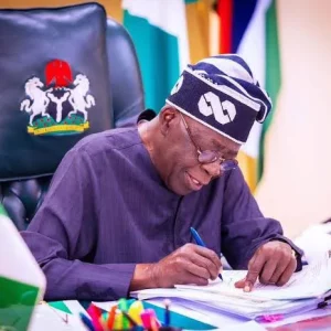 President Bola Tinubu signing