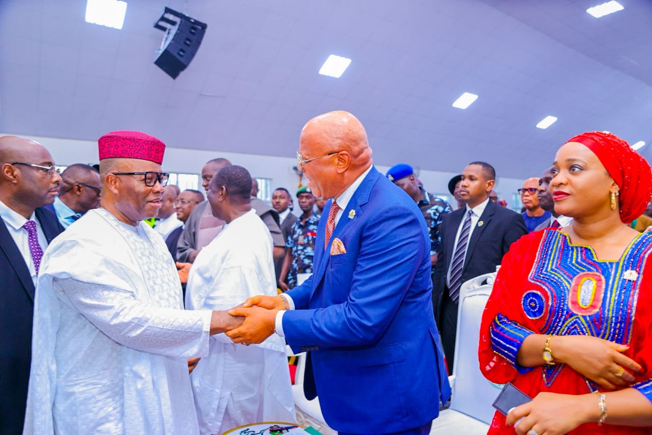 Senate President Godswill Akpabio in a warm handshake with Akwa Ibom State Governor Pastor Umo Eno