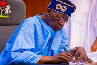 Tinubu signs